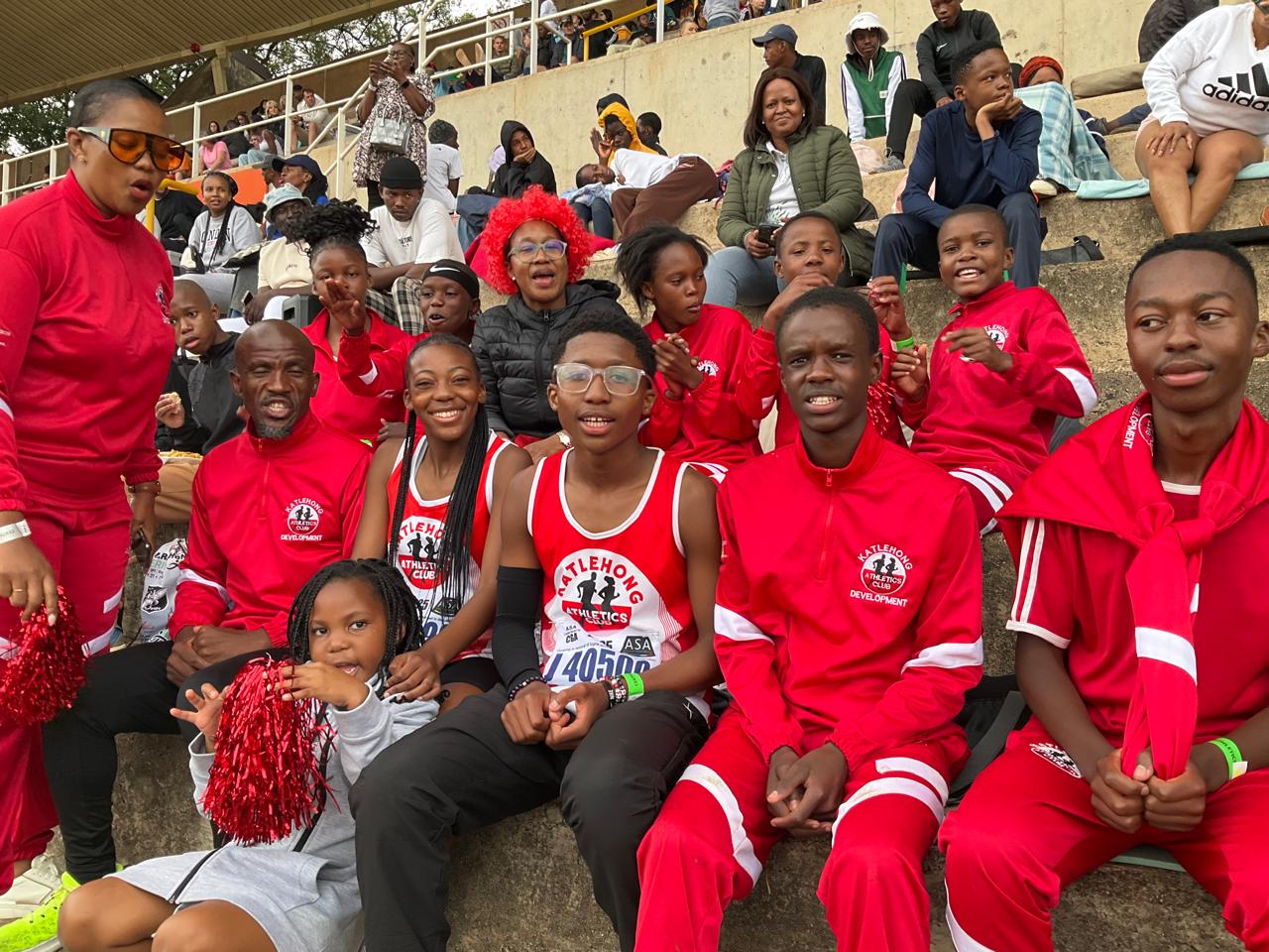Mphathi and a Katlehong athletics community group at a sporting event