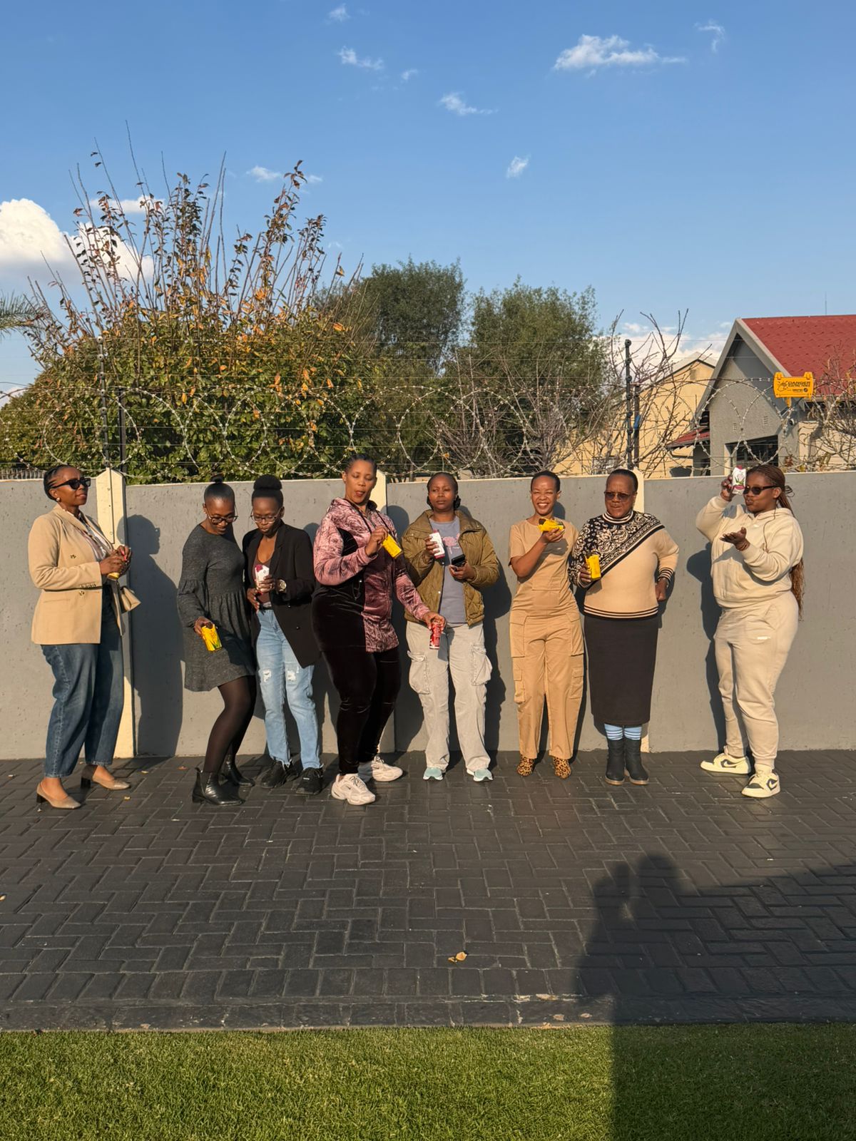 Community members celebrating together outdoors
